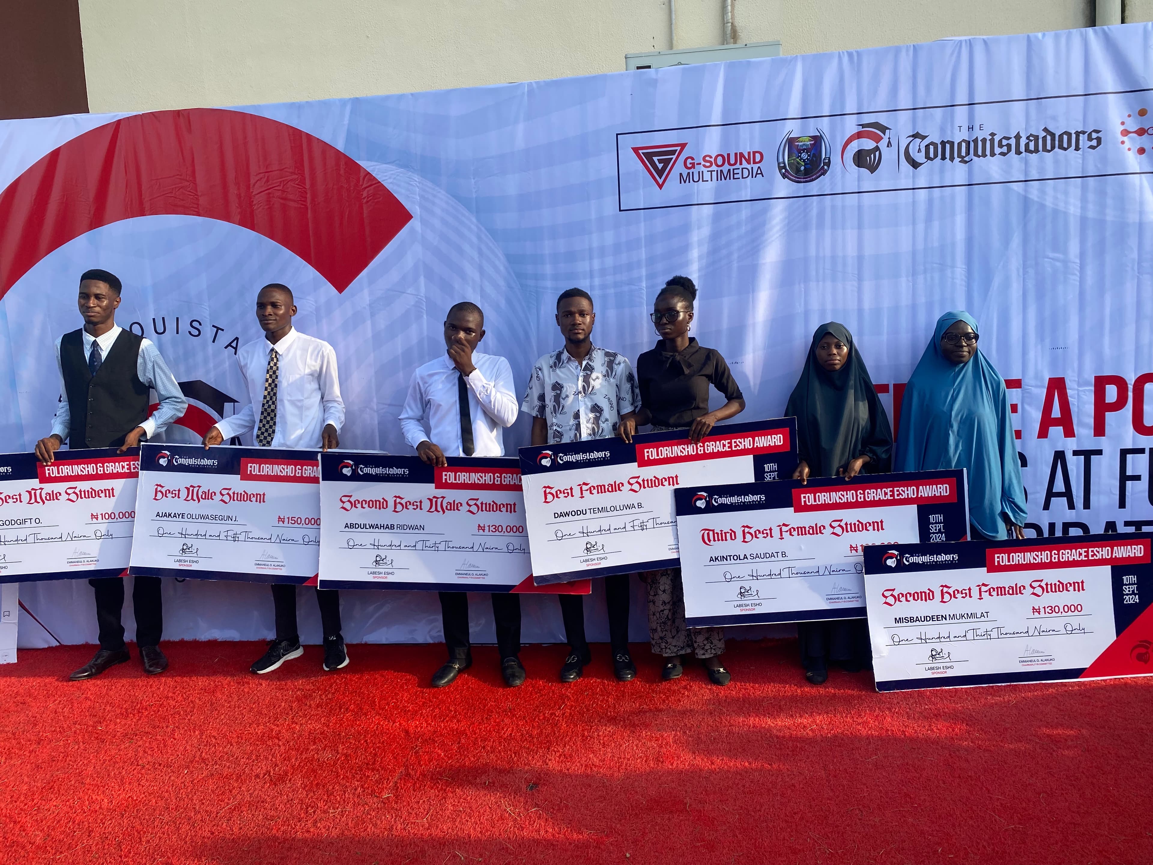2024 STEM Award recipients with cheques